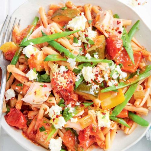Pasta with hot smoked salmon, ratatouille and ricotta