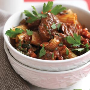 Rigatoni with slow-cooked beef ragu and silver beet